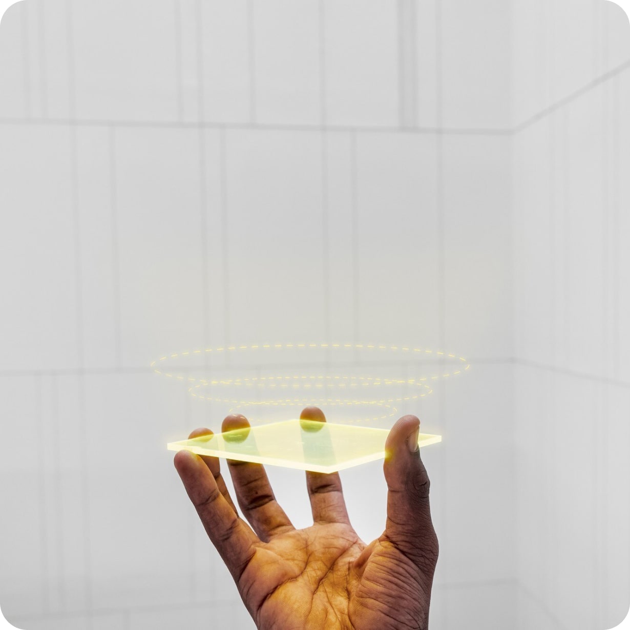 Hand holding glass representing innovation